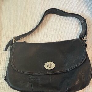 Coach Black Shoulder Bag with Sleek Design and Silver Accents